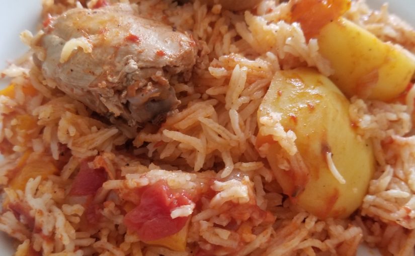Chicken with rice, peppers and potatoes